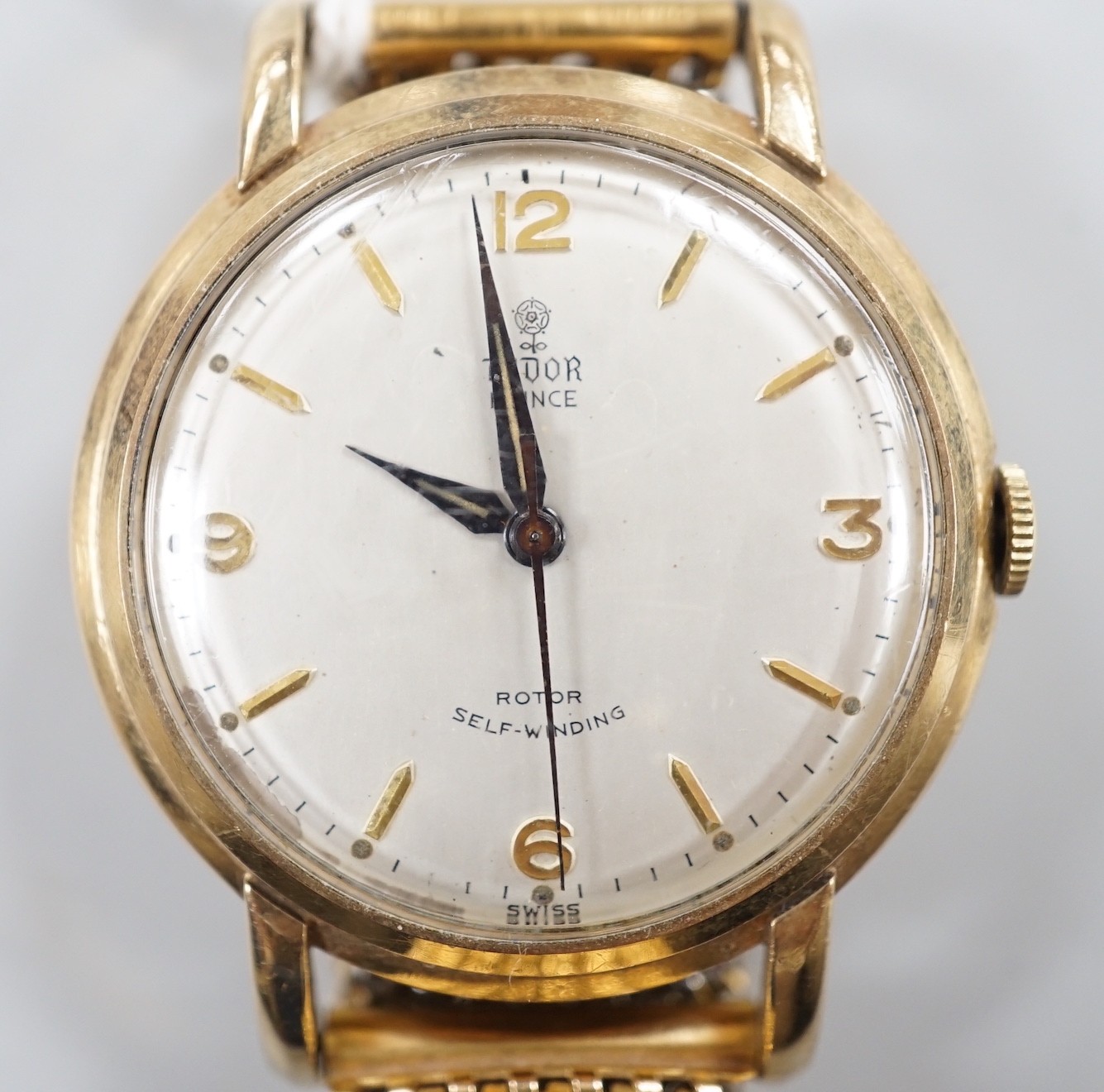 A gentleman's 9ct gold Tudor Prince Rotor Self-Winding wrist watch, on later associated flexible bracelet, case diameter 35mm, with Tudor box.